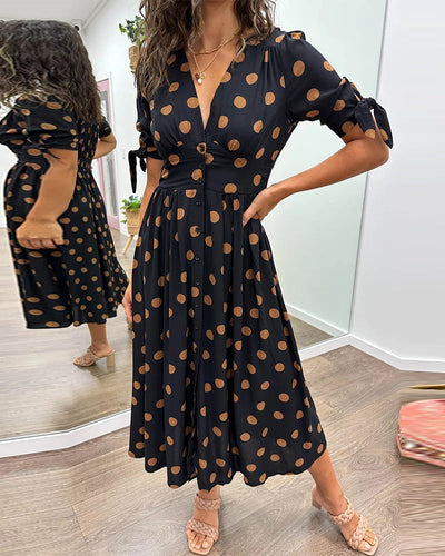 Elegante jurk met stippenprint